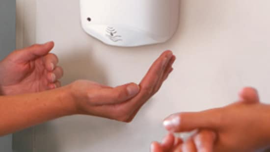 Nexa soap dispenser putting soap in hands