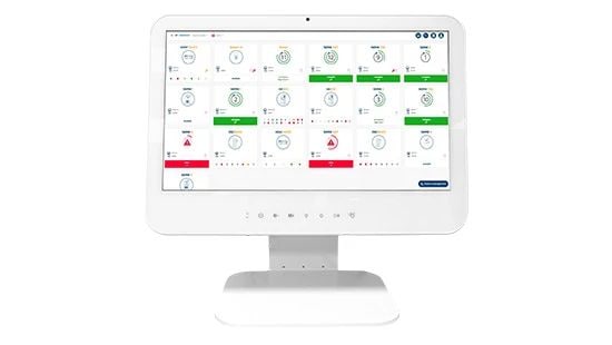 Monitor displaying a dashboard with circular graphs and colored indicators.
