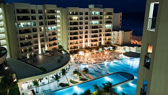 iStock_000012595032Large_resort_pool_at_night.jpg